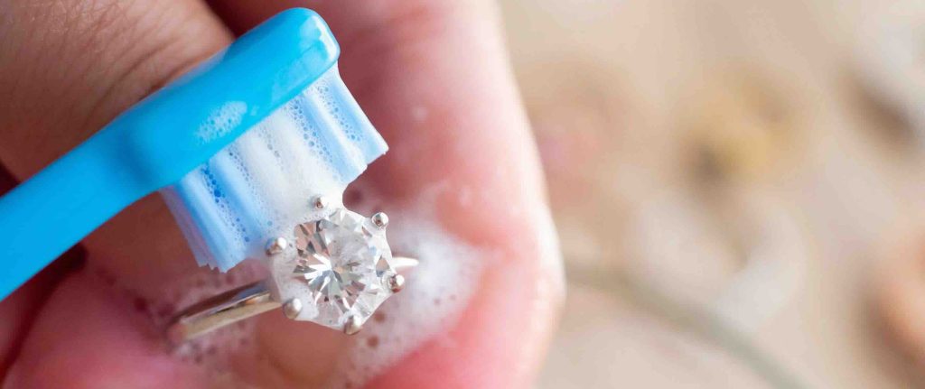 Solitaire Diamond Ring Cleaning with a Toothbrush
